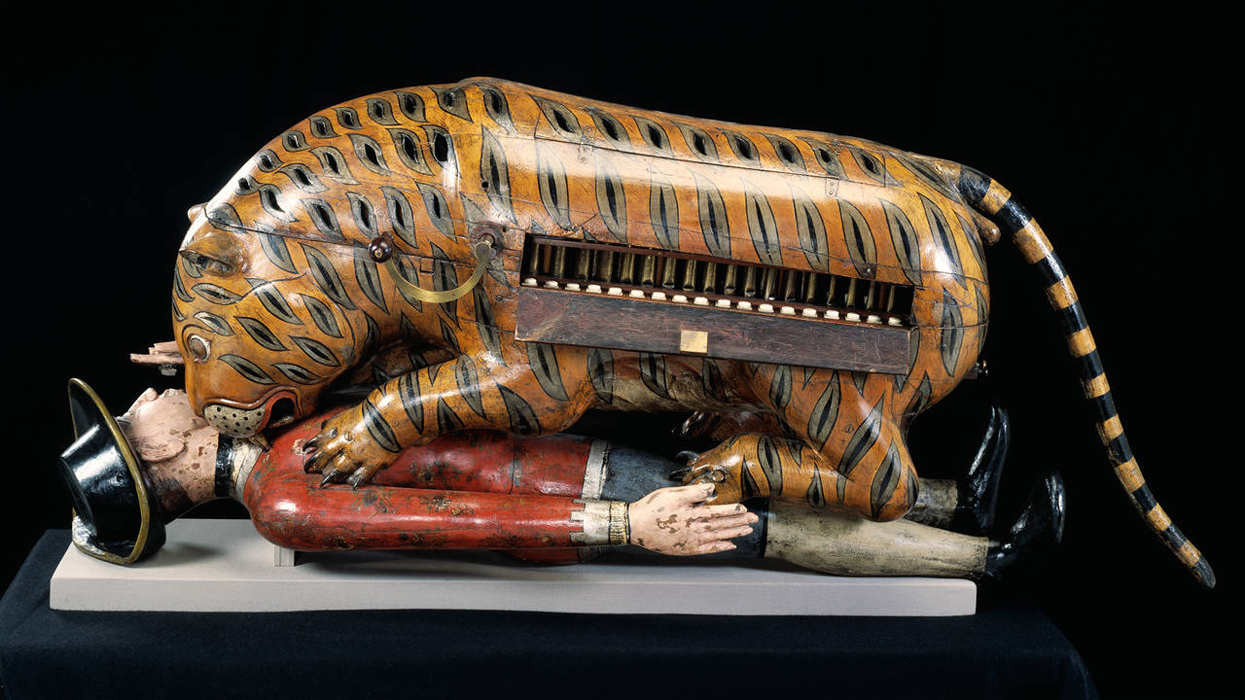 Tipu's Tiger - A stylised wooden tiger attacking a soldier.